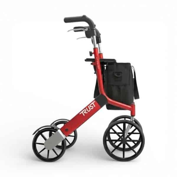 Röd Lets Go Out Rollator Lets Go Out rollator i röd färg från Trust Care med stora hjul och ergonomiska handtag.