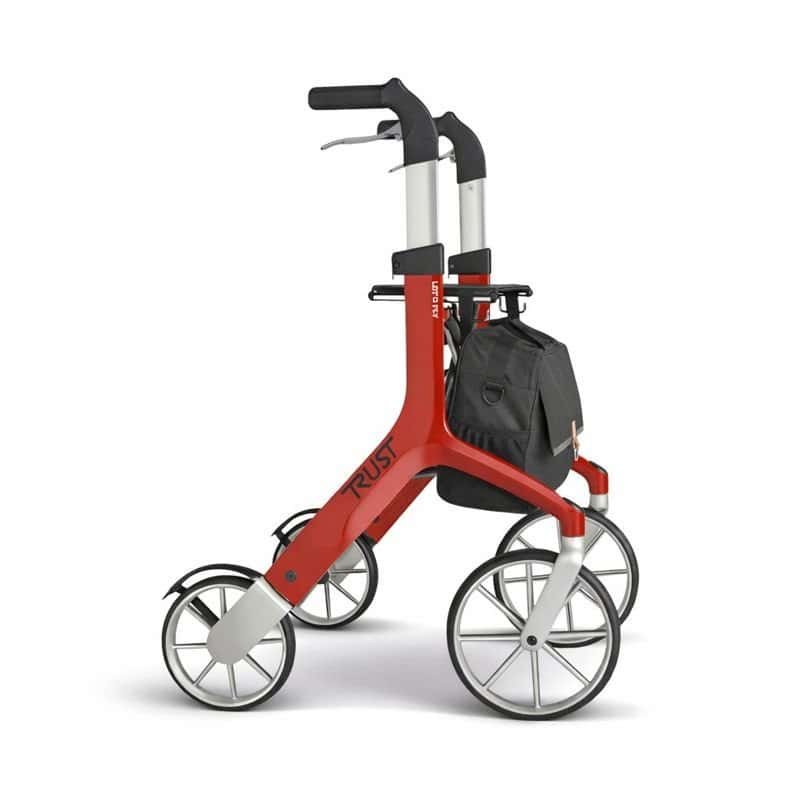Trust Care Let’s Fly rollator i röd färg med väska. Designrollator med ergonomiska handtag och stötdämpande hjul.